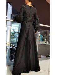 Long Dress with Puffed Sleeves: Black Elegance with Detachable Belt