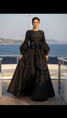 Long Dress with Puffed Sleeves: Black Elegance with Detachable Belt طويل بحزام  فيونكه